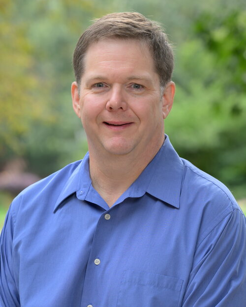 John P.  Caughlin