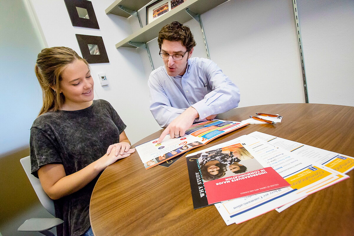 Advisor Neil Baer with a student
