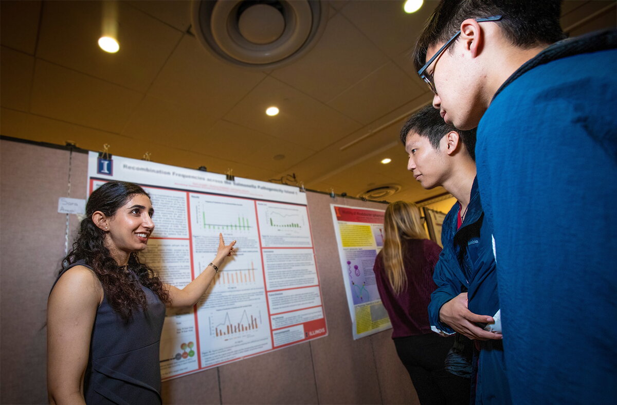 student presenting research