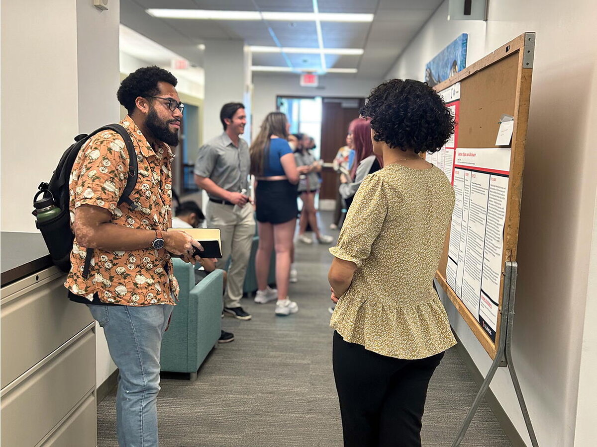 student presenting research