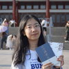 Picture of a student holding books