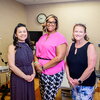 Communication professor Charee Thompson, Dr. Tiffani Dillard and communication professor Mardia Bishop in a patient exam room