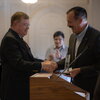 michael mcdonald receives alumni award at a ceremony