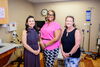 Communication professor Charee Thompson, Dr. Tiffani Dillard and communication professor Mardia Bishop in a patient exam room