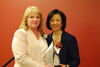 Barbara Hall receives an award from the chancellor